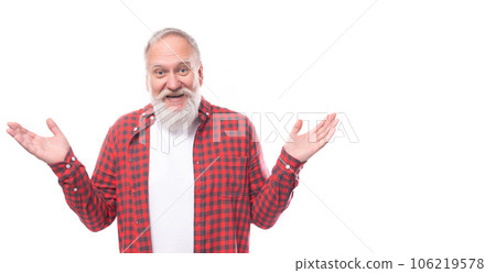 smiling 60-year-old gray-haired pensioner man with a beard and mustache in a casual manner spreads 106219578