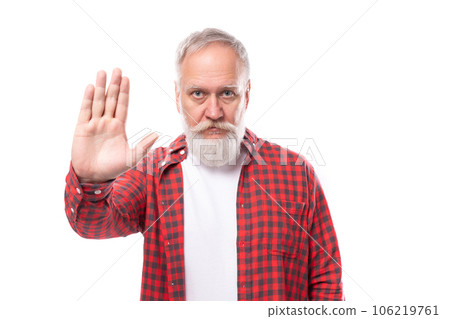 handsome 60s retired man with white beard and mustache asks to stop 106219761