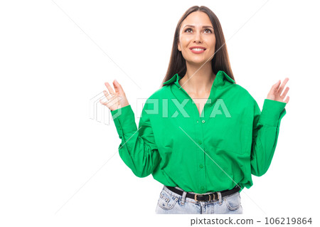 portrait of a smart pensive slim cute brown-eyed brunette woman dressed in a green shirt smiling on portrait of a smart pensive slim cute brown-eyed brunette woman dressed in a green shirt smiling on 106219864