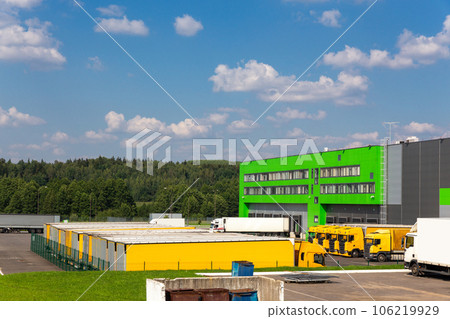 Distribution warehouse with trucks of different capacity. Distribution warehouse with trucks of different capacity. 106219929