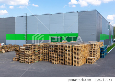 Wooden pallets heap in the cargo warehouse 106219934