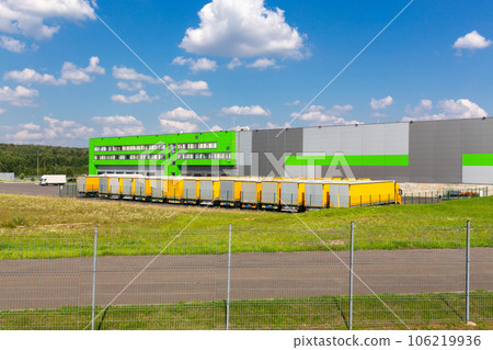 Distribution warehouse with trucks of different capacity. Distribution warehouse with trucks of different capacity. 106219936