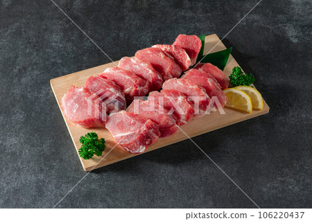 Cut Pork Fillet Platter on a Cutting Board 106220437