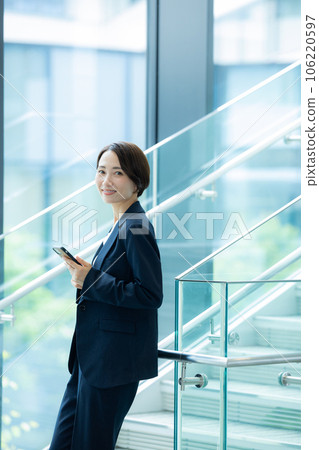 Middle business woman Middle business woman 106220597