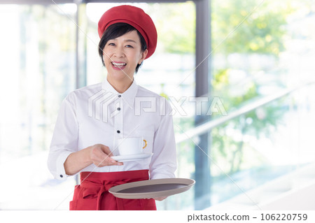A middle-aged woman working at a restaurant Photography cooperation "LINK FOREST" A middle-aged woman working at a restaurant Photography cooperation "LINK FOREST" 106220759
