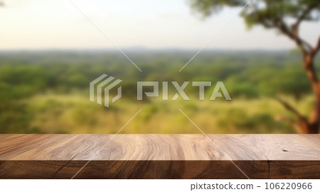The empty wooden brown table top with blur background of Savanna Safari. Exuberant. The empty wooden brown table top with blur background of Savanna Safari. Exuberant. 106220966