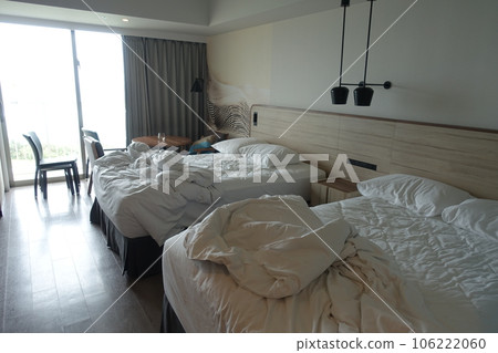 Messy hotel bed at checkout Messy hotel bed at checkout 106222060