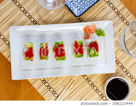 Uramaki with tobico topping Uramaki with tobico topping 106222444