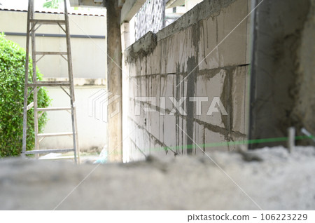 interior construction industry with steel ladder cement wall texture background interior construction industry with steel ladder cement wall texture background 106223229