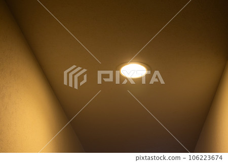 ceiling lights illuminating the corridor ceiling lights illuminating the corridor 106223674