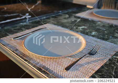 fork, knife and a circle shape plate on table fork, knife and a circle shape plate on table 106224521