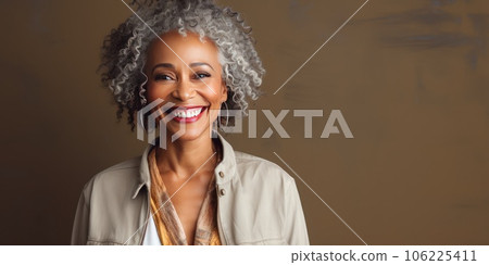 Middle-aged woman with a short gray hairdo looking at camera. 106225411