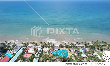 Aerial view of Swimming pool and the beach in the Phan Thiet resort, Binh Thuan Province, Viet Nam Aerial view of Swimming pool and the beach in the Phan Thiet resort, Binh Thuan Province, Viet Nam 106225579