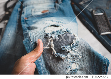 making distressed jeans making distressed jeans 106225837