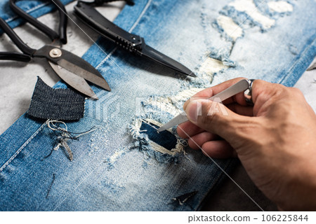 making distressed jeans making distressed jeans 106225844