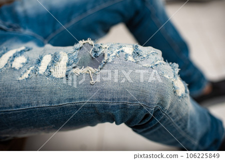 torn on blue jeans torn on blue jeans 106225849