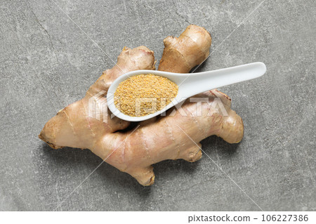 Seasoning and spices concept - ginger, homemade seasoning 106227386