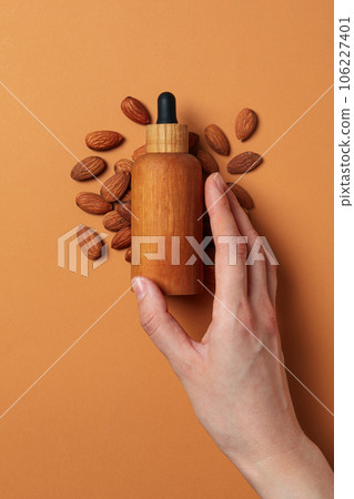 Skin care and body care concept - almonds, almond oil 106227401