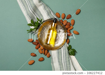 Skin care and body care concept - almonds, almond oil 106227412