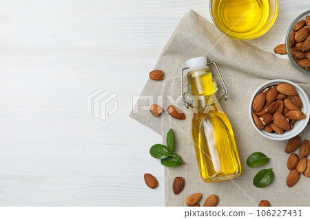 Skin care and body care concept - almonds, almond oil Skin care and body care concept - almonds, almond oil 106227431