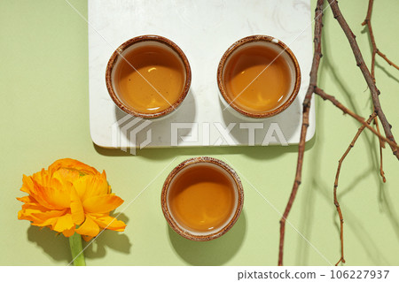 Cozy and tasty hot drink concept - asian tea Cozy and tasty hot drink concept - asian tea 106227937