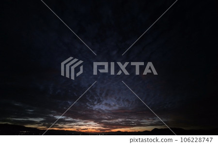 Summer dawn sky with colorful clouds, super wide angle, sky-based, 230819am 106228747