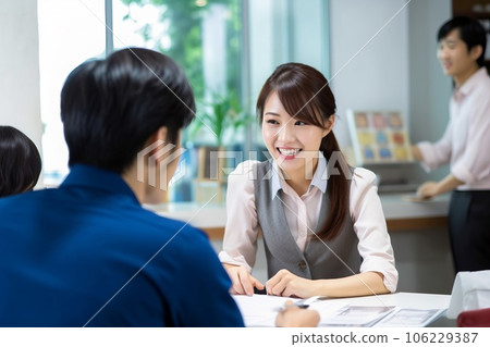 Female employee talking with a smile AI generated image AI image 106229387