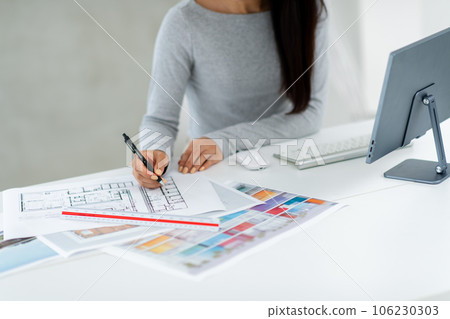 Architect, interior designer, desk work 106230303