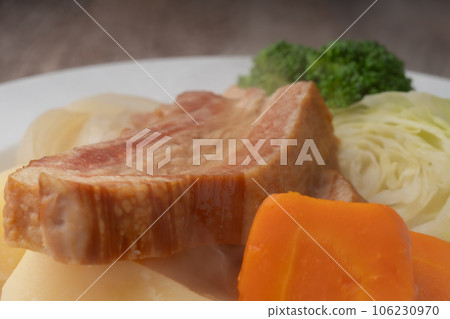 Pour the pot-au-feu soup 106230970