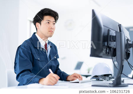 Construction management and desk work Construction management and desk work 106231726