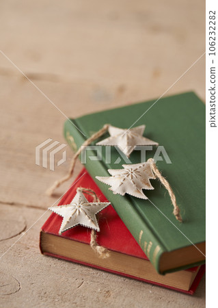 Christmas image Ornaments placed on old books 106232282