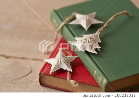 Christmas image Ornaments placed on old books 106232312
