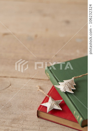Christmas image Ornaments placed on old books 106232324