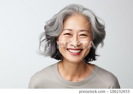 Close-up portrait of a stylish beautiful Asian woman in her 50s. Close-up portrait of a stylish beautiful Asian woman in her 50s. 106232655
