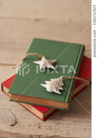 Christmas image Ornaments placed on old books 106232925