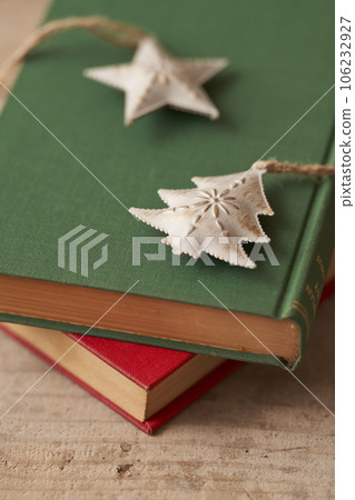 Christmas image Ornaments placed on old books 106232927