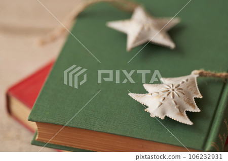 Christmas image Ornaments placed on old books 106232931