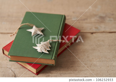 Christmas image Ornaments placed on old books 106232933