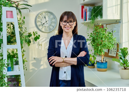 Middle aged elegant confident woman looking at camera 106235718