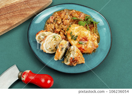 Sliced baked squid stuffed with rice. Sliced baked squid stuffed with rice. 106236054