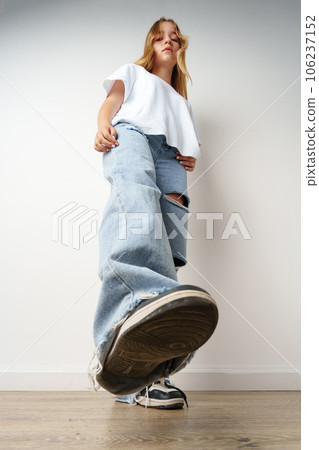 Portrait of young beautiful cute teen girl posing at camera 106237152