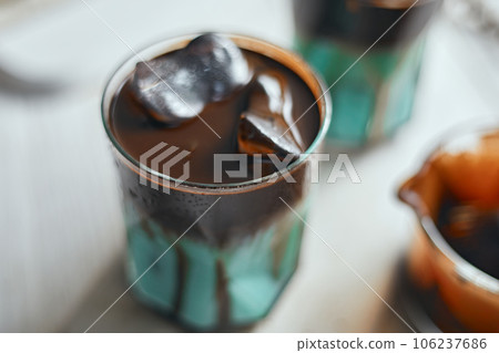 Signature iced chocolate mint drink in glass Signature iced chocolate mint drink in glass 106237686