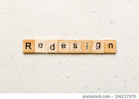 REDESIGN word made with wooden blocks concept 106237879