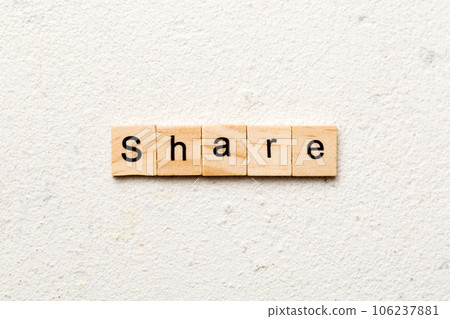 share word written on wood block. share text on table, concept share word written on wood block. share text on table, concept 106237881