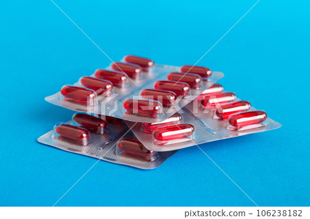 too many different pill cartridges stacked. selective Focus. Packs of blister pills with tablets. Colored pastilles packages. A pile of medicine in blister packs. Pharmaceutical blister packs 106238182