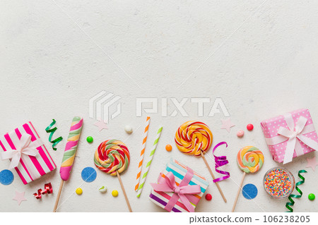 Collection of birthday party objects with gift box. Valentines day gift box. Top view flat lay with copy space Collection of birthday party objects with gift box. Valentines day gift box. Top view flat lay with copy space 106238205