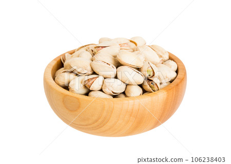 Roasted pistachio nut in bowl isolated on white background. pistachio nut is snack or raw of cook. Healthy food concept Roasted pistachio nut in bowl isolated on white background. pistachio nut is snack or raw of cook. Healthy food concept 106238403