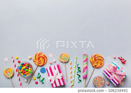 Collection of birthday party objects with gift box. Valentines day gift box. Top view flat lay with copy space Collection of birthday party objects with gift box. Valentines day gift box. Top view flat lay with copy space 106238491