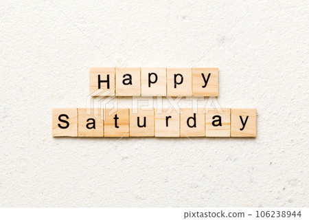 Happy saturday word written on wood block. Happy saturday text on cement table for your desing, concept 106238944