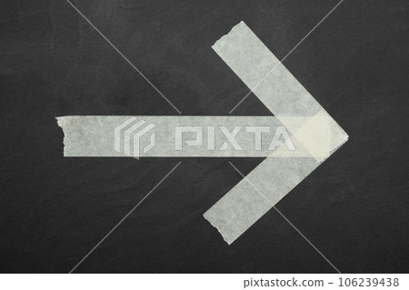 arrow ,close up of an adhesive tape arrow ,close up of an adhesive tape 106239438